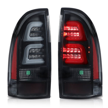 Solid Spare Fit For 2005-2015 Toyota Tacoma Black Smoked LED Tube Tail Lights Lamps LH+RH