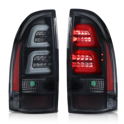 Solid Spare LED Tube Tail Lights Brake Lamps Smoke/Black Fit For 2005-2015 Toyota Tacoma